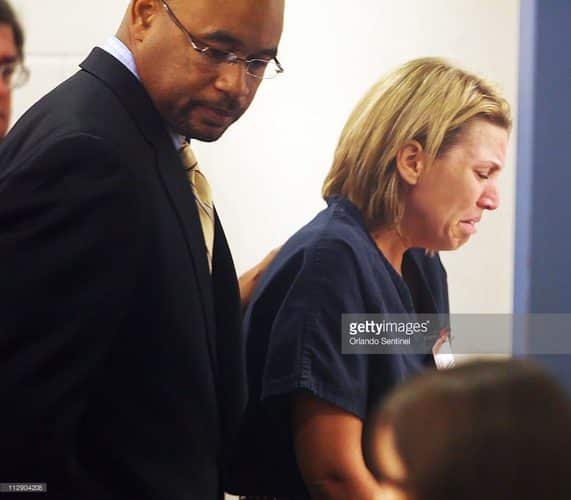 Amanda Brumfield, right, with attorney Charles Emanul, Jr., reacts Thursday, June 25, 2009, as she makes her initial court appearance on charges of first-degree murder and aggravated child abuse of a 1-year-old girl she was babysitting. (Red Huber/Orlando Sentinel/MCT)