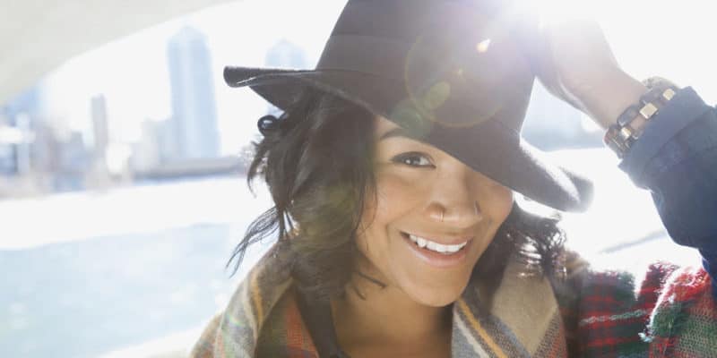 Portrait of smiling woman with hat