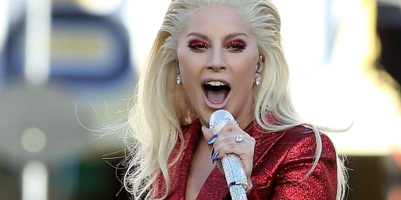 SANTA CLARA, CA - FEBRUARY 07: Recording artist Lady Gaga performs the national anthem prior to Super Bowl 50 between the Denver Broncos and the Carolina Panthers at Levi's Stadium on February 7, 2016 in Santa Clara, California. (Photo by Streeter Lecka/Getty Images)