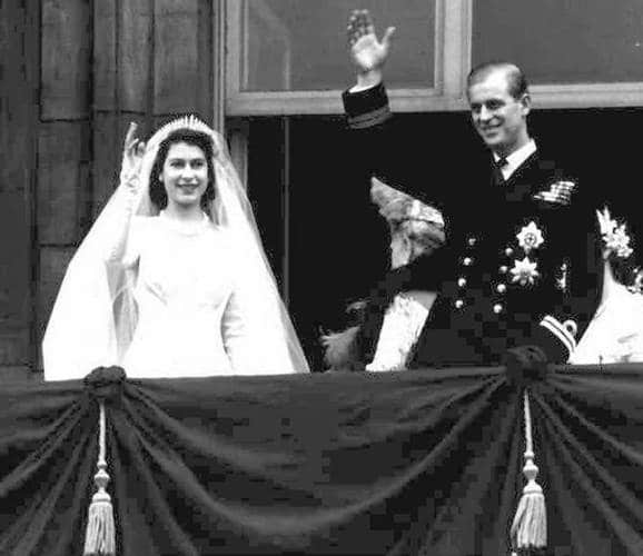 FILE -- Princess Elizabeth, left, and her husband Prince Philip, wave from the balcony of London's Buckingham Palace, following their wedding at Westminster Abbey, in this November 20, 1947 file photo. Britain's Queen Elizabeth II celebrates her 75th birthday on Saturday, April 21, 2001.(AP