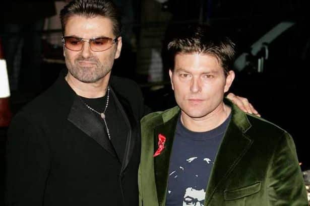 george-michael-and-kenny-goss-arrive-for-a-film-premiere-in-2005-pic-getty-images-463288157